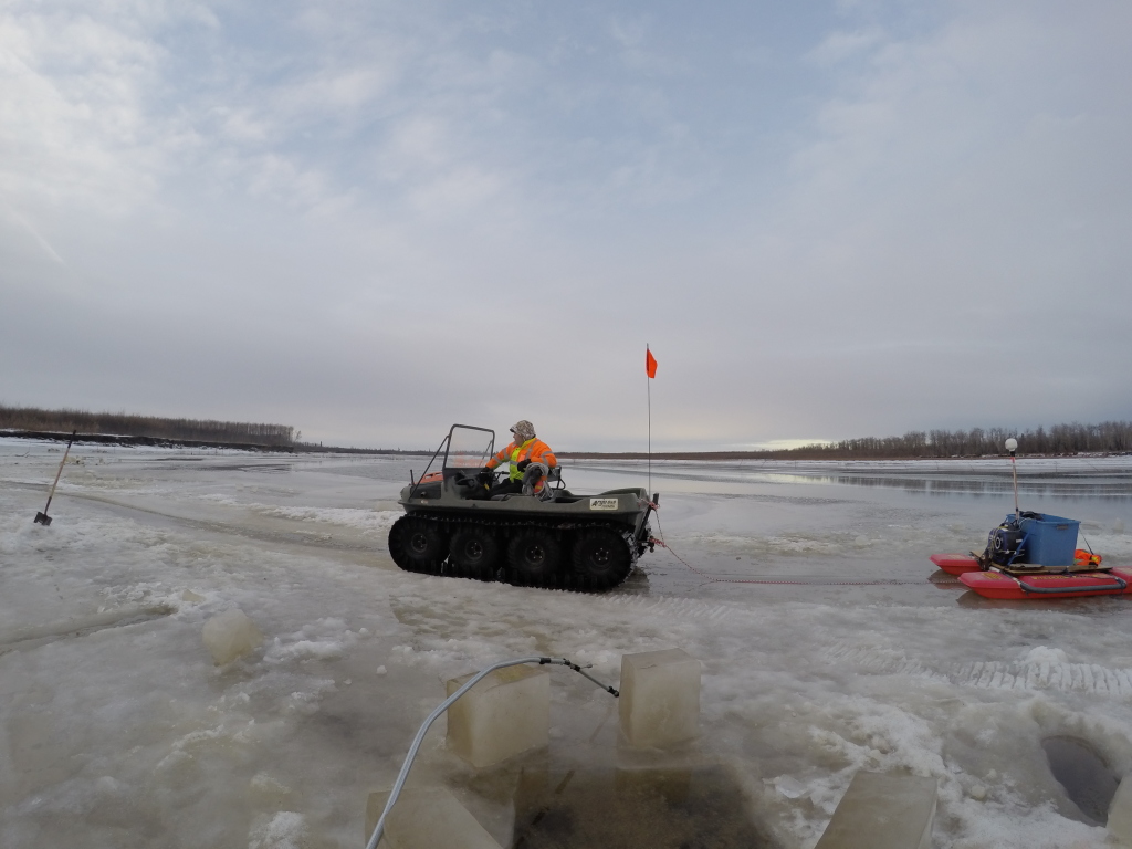 Bethel's SAR member Mark pulling me over the ice. 